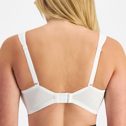 White Be By Berlei Active Everyday sports bra worn by active women on a plain background