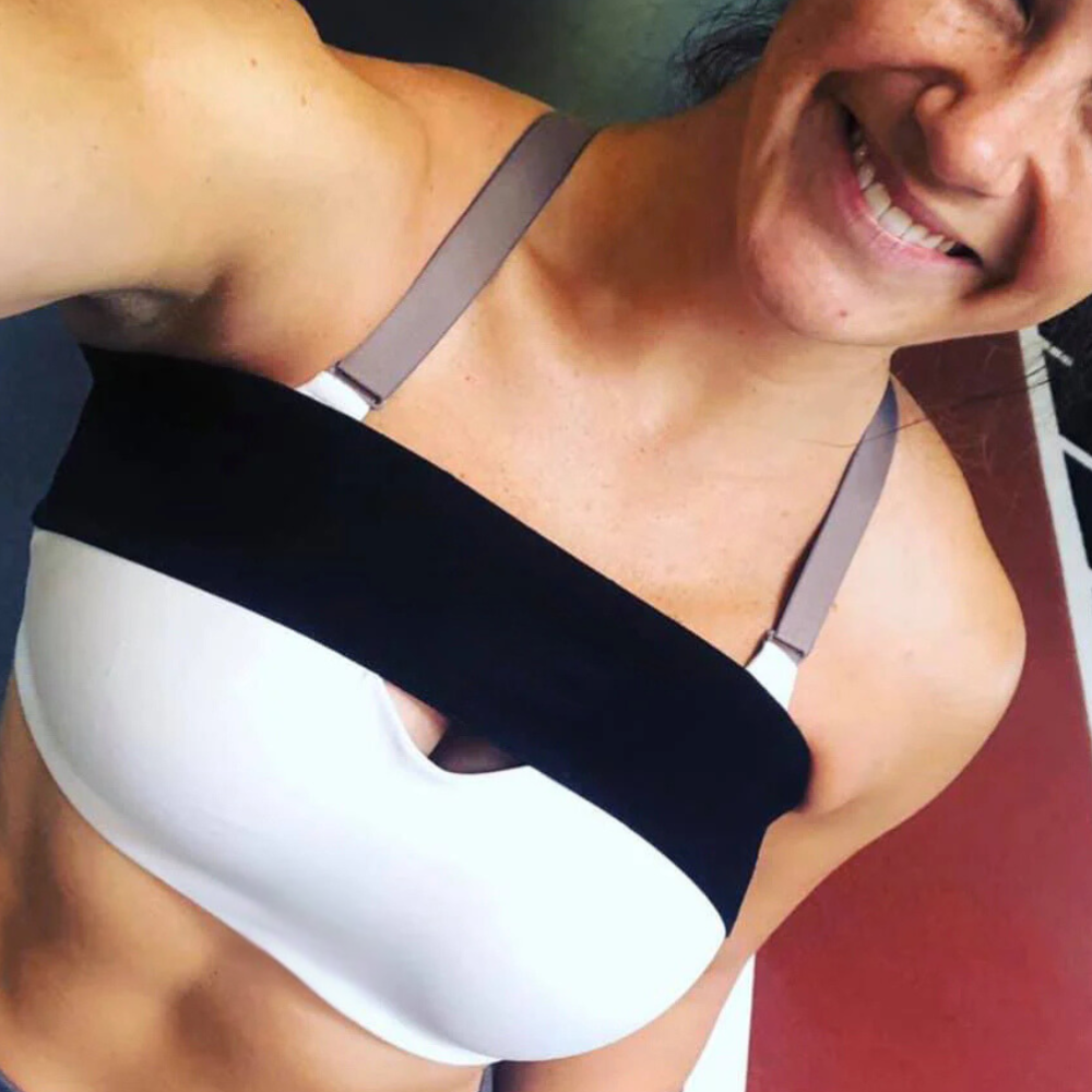 Active women wearing a compression band over her crop top