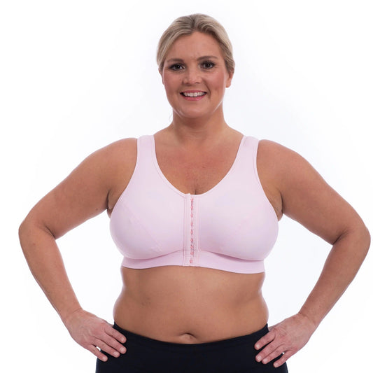 Curvy women wearing Enell Lite bra in colour Hope showing front fastening view
