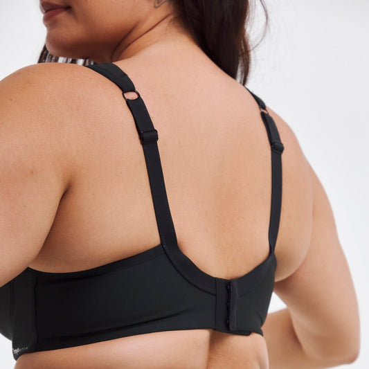active woman wearing Freya High Octane Underwire sports bra showing back view