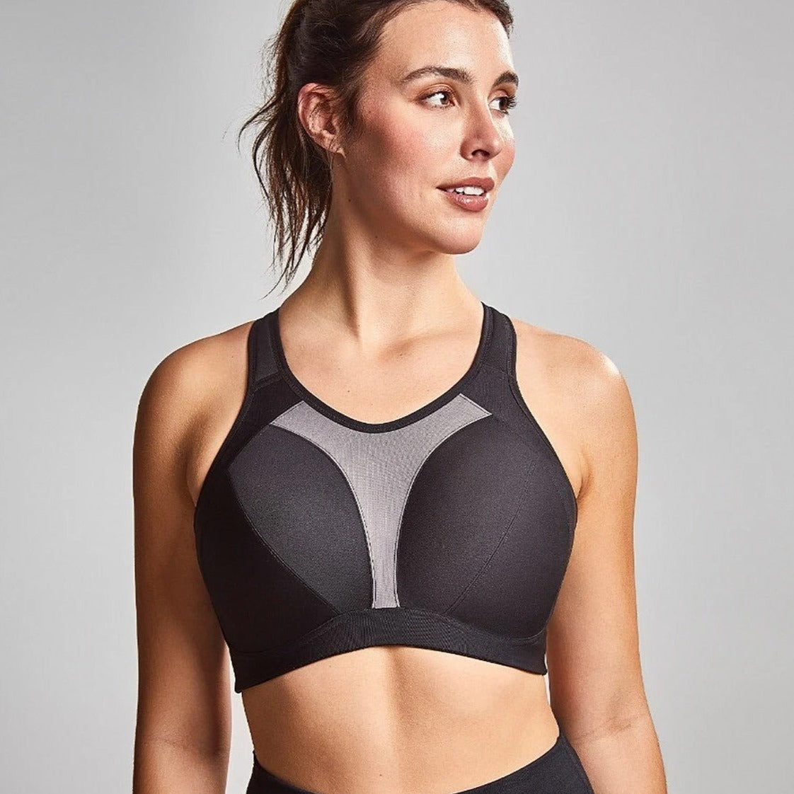Women wearing the Royce high impact sports bra showing front details