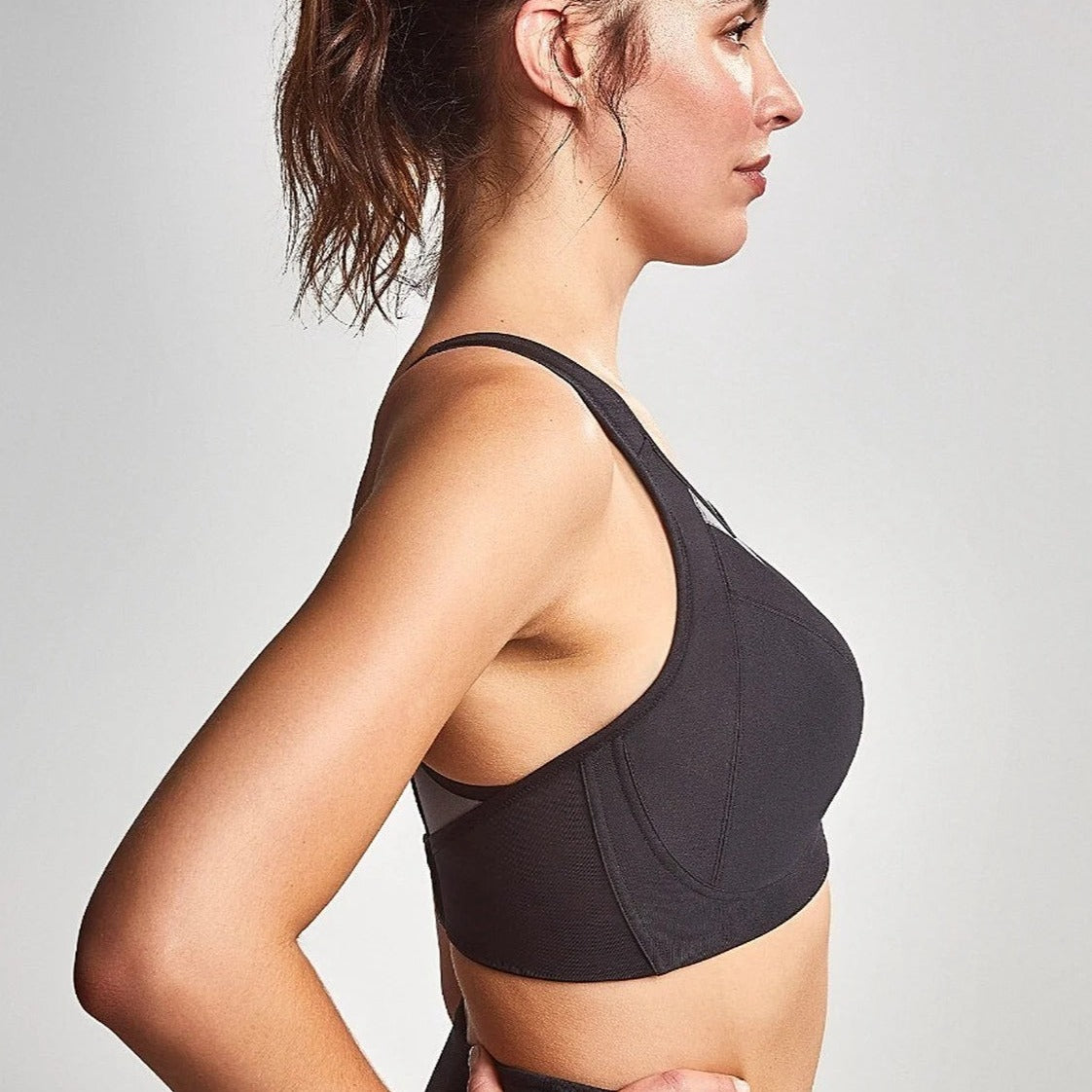Image of women wearing Royce sports bra showing you the side view